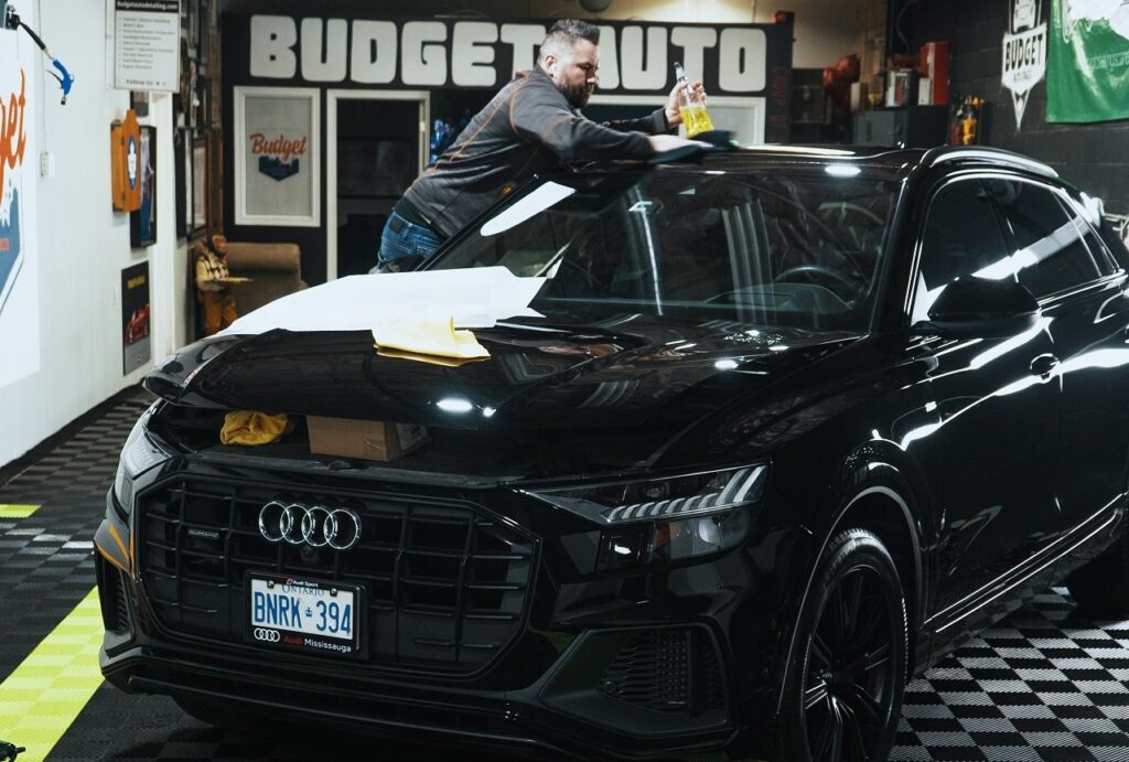 black car gets ceramic coating at budget auto detailing in burlington on